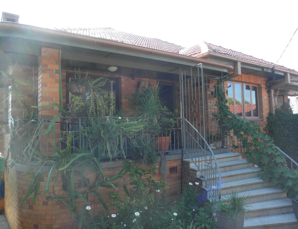This is an image of the Heritage Place known as the Gubar Residence located on 19 Corsica Street in Moorooka