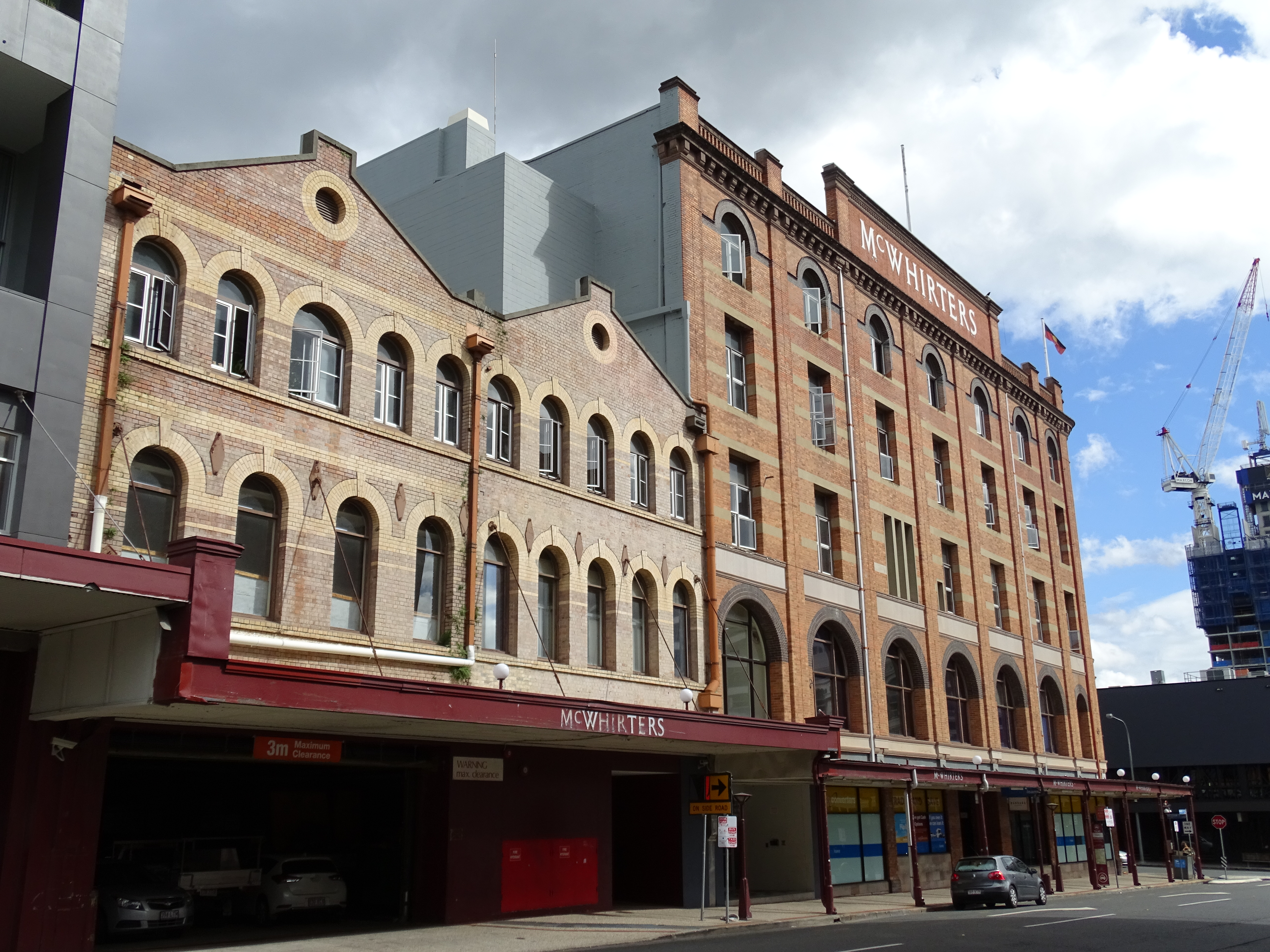 This is an image showing the Heritage Place known as McWhirters Store (former), viewed from Warner Street.