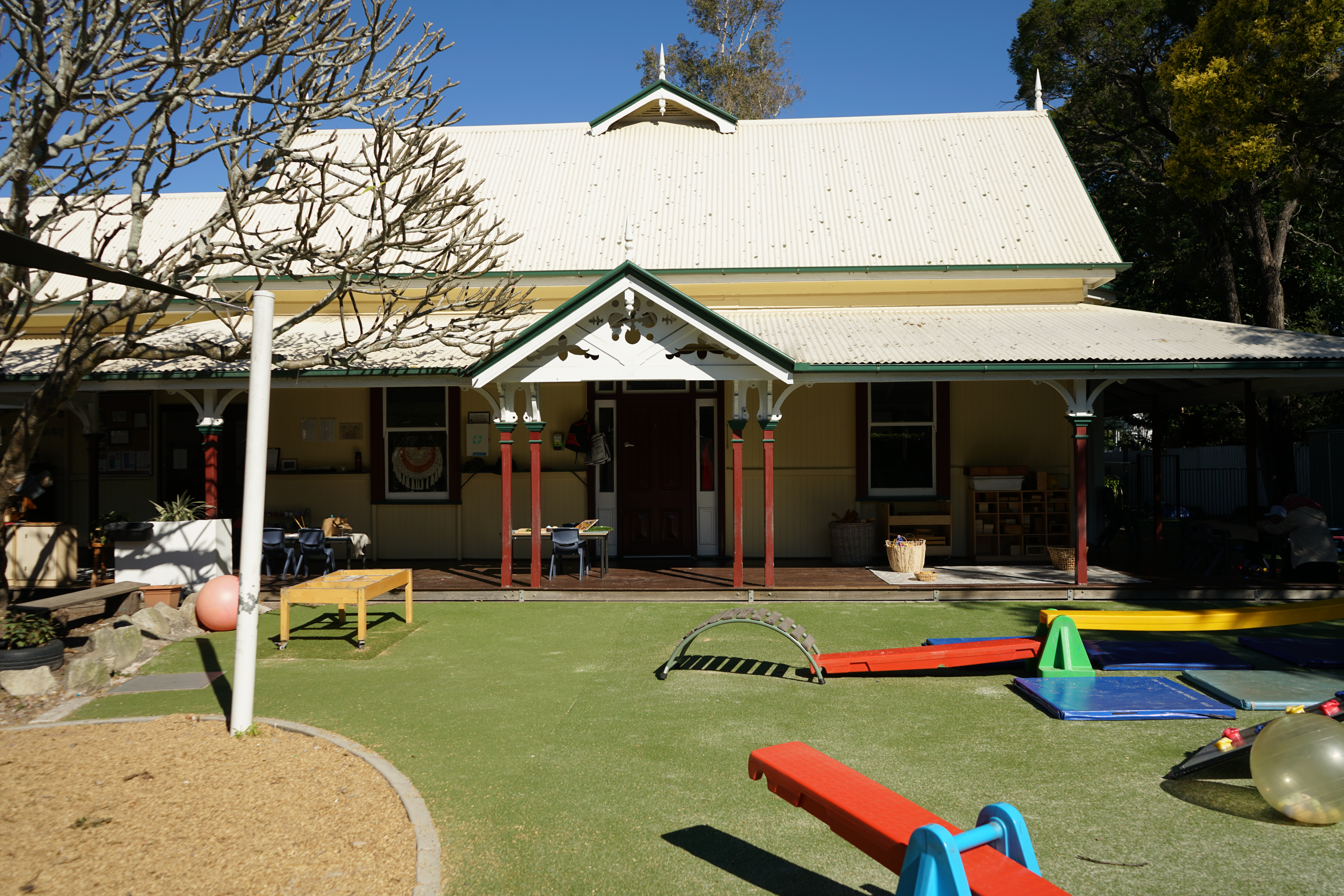 A house with a verandah and entry gable.