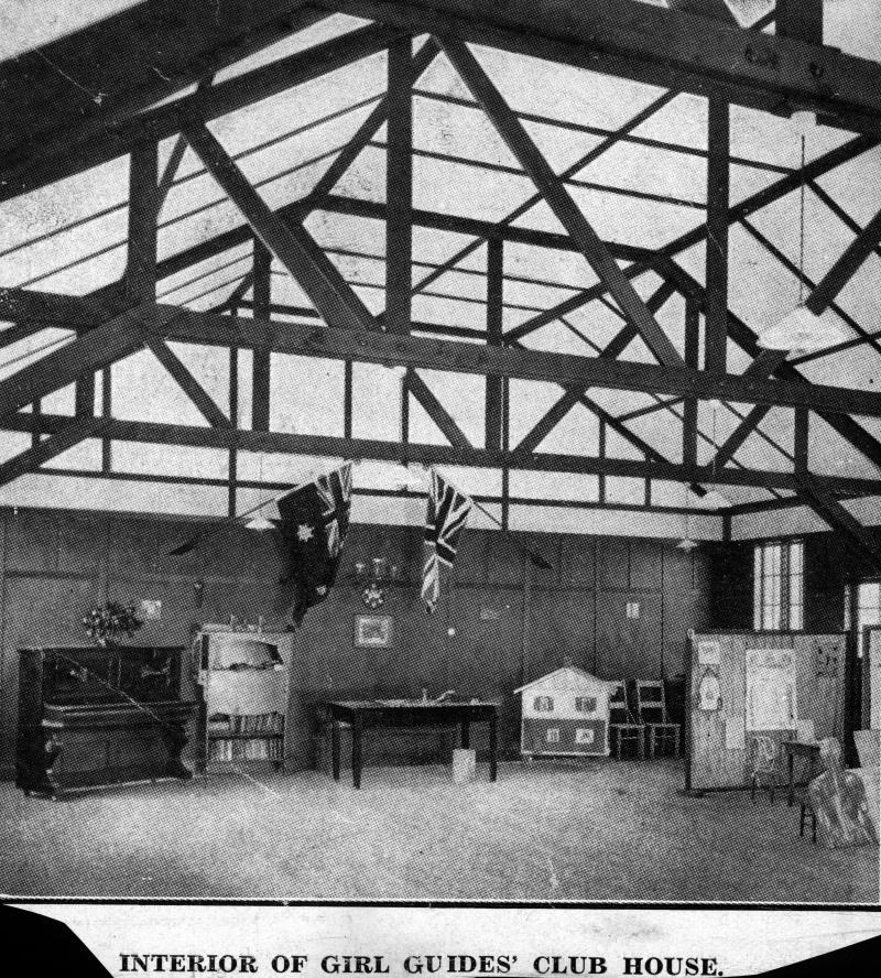 This is an image of 'Girl Guides' hut at Clayfield, Brisbane, 1929', showing the interior of the new Girl Guides' club house.