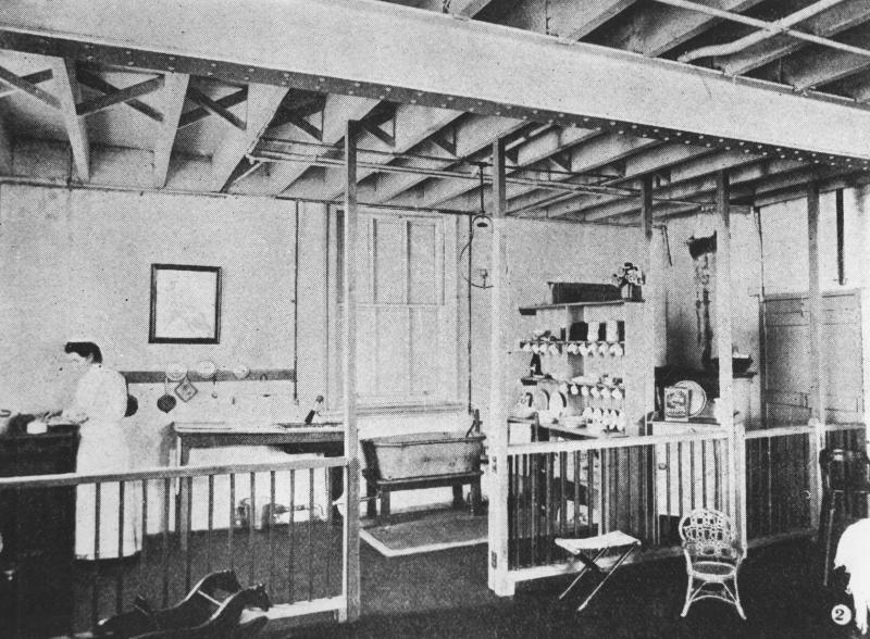 This is an image of ‘Creche at the Brisbane Institute of Social Service, 1907', showing an internal view of the creche.