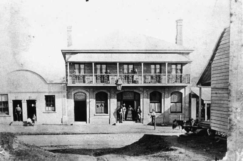 This is a view of 'Crown Hotel, Lutwyche, Brisbane, ca. 1881', looking west from the corner of Lutwyche Road and High Street, Lutwyche.