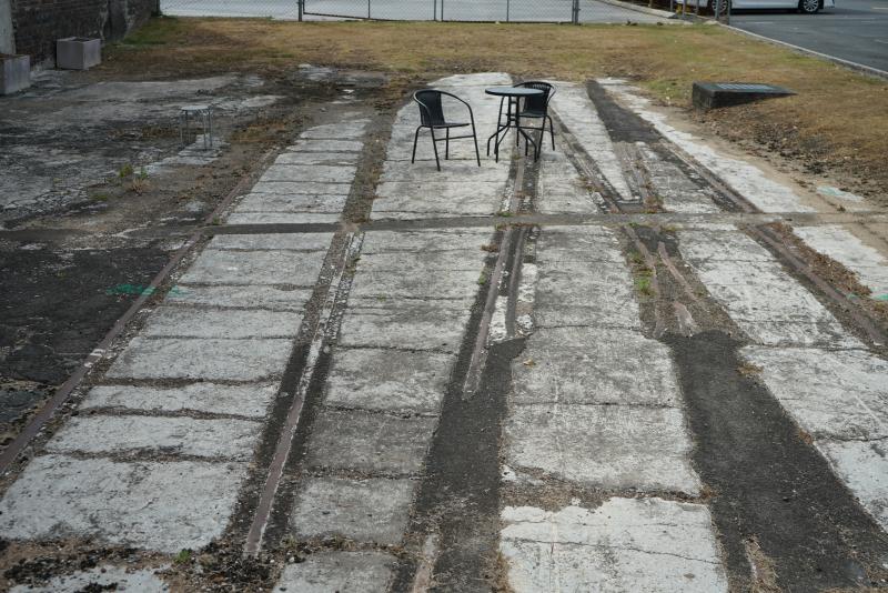 Remnant railway track line outside the front of the building