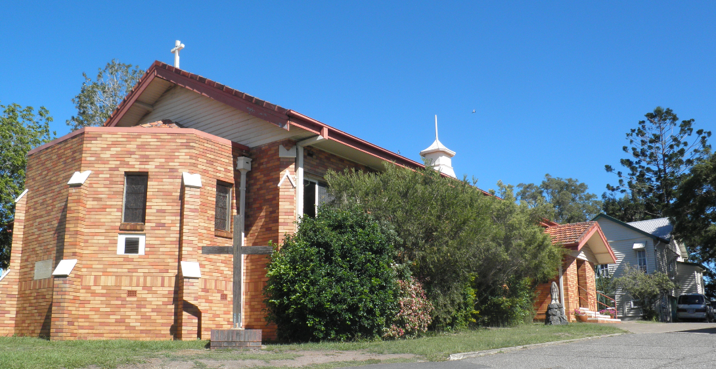 This is an image of St James Church and Rectory from Enoggera Road