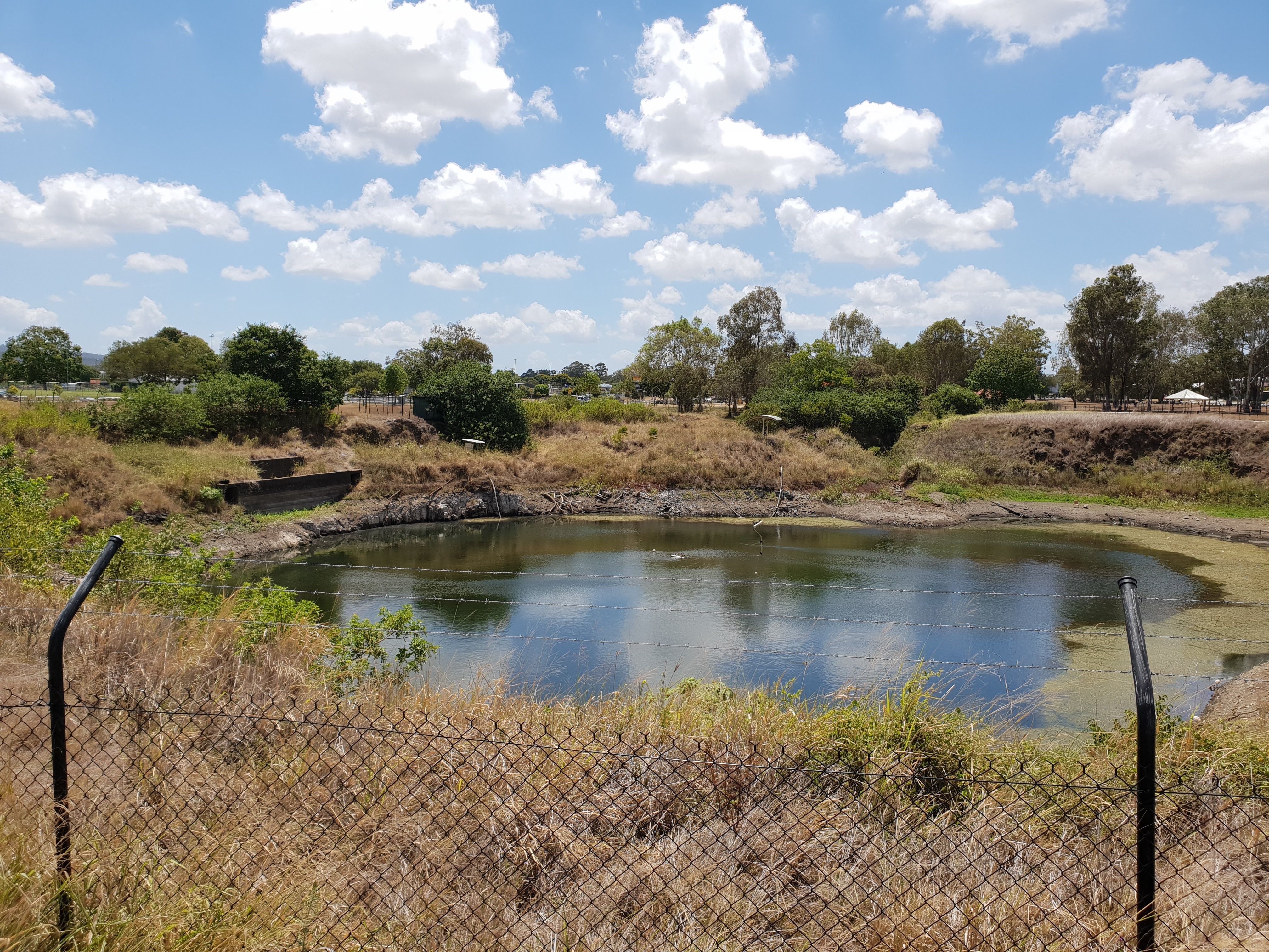 This is an image of the local heritage place known as Acacia Ridge Air Raid Shelter - viewed within the context of it's location within Carr's Quarry. Photograph taken 28 January 2019.