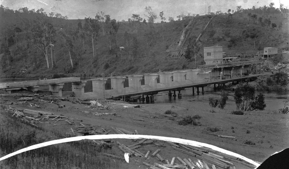 This is a historical image of the construction of the weir at Mount Crosby, ca. 1926