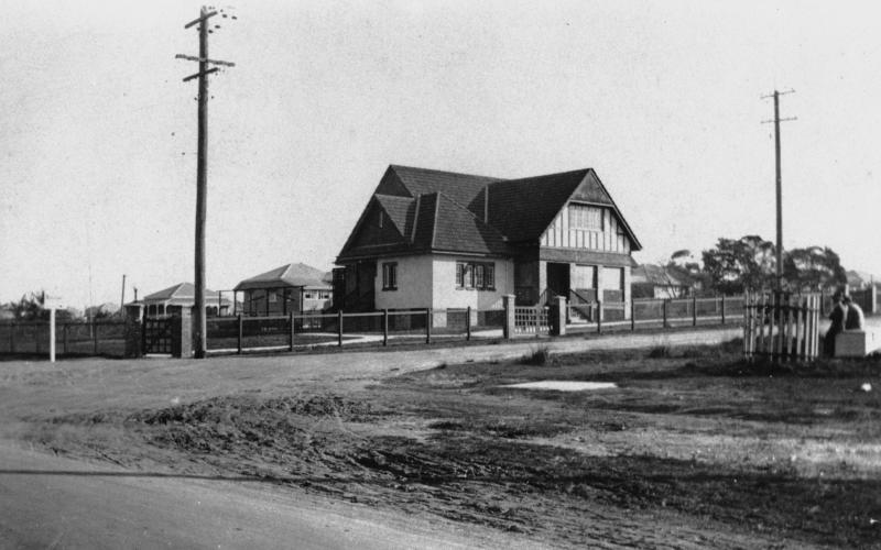 This is an image of ‘House in Rode Rd, Nundah, 1930’, viewed from the corner of Sandgate and Rode roads, Nundah, looking south-west.