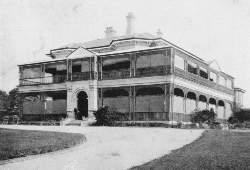 This is an image of ‘Front view of Nyrambla in Ascot, 1932’, viewed from the former grounds of the house, near the intersection of Yabba and Henry streets, Ascot, looking south-west.