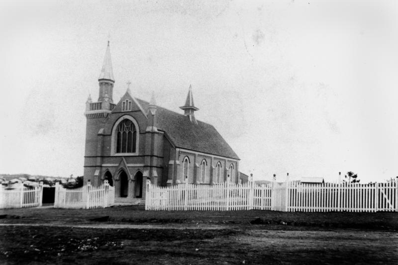 This is an image of ‘Nazareth Lutheran Church at Woolloongabba, Brisbane, 1896’, viewed from the corner of Hawthorne & Gibbon streets, Woolloongabba, looking south-east.