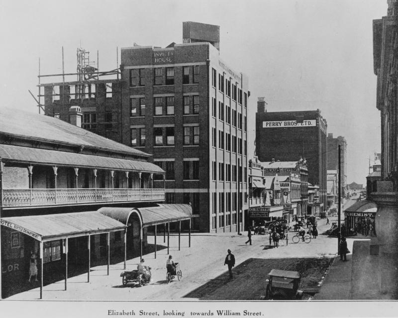 This is an image of ‘Elizabeth Street, looking towards William Street, Brisbane, 1924’, looking towards Invicta House and Edward Street, from Elizabeth Street, Brisbane, looking south-west.