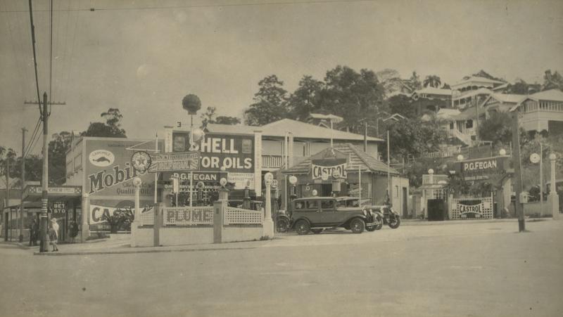 This is an image of ‘P.G. Fegan's Service Station in Newstead, ca. 1935', viewed from the corner of Breakfast Creek Road & Jordan Terrace, Newstead, looking south-west.